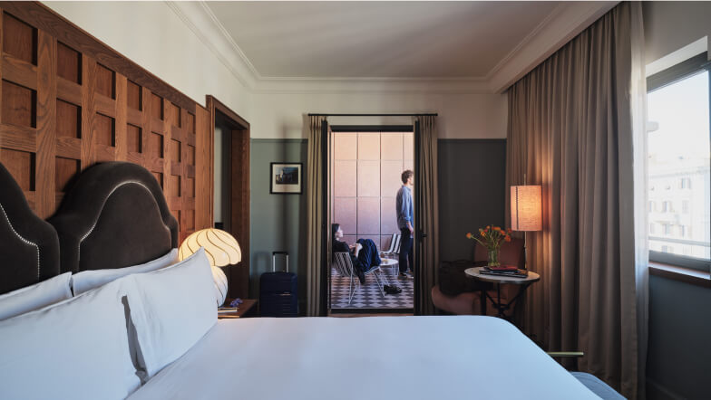 A freshly made hotel bed
