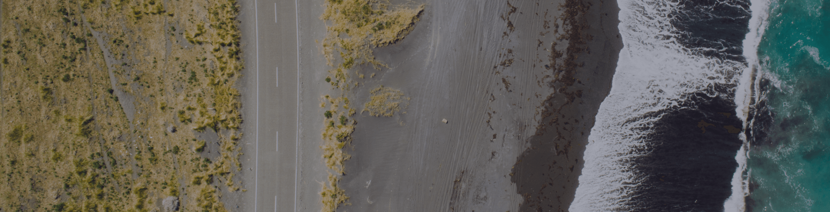 Birds-eye view of a coastal road